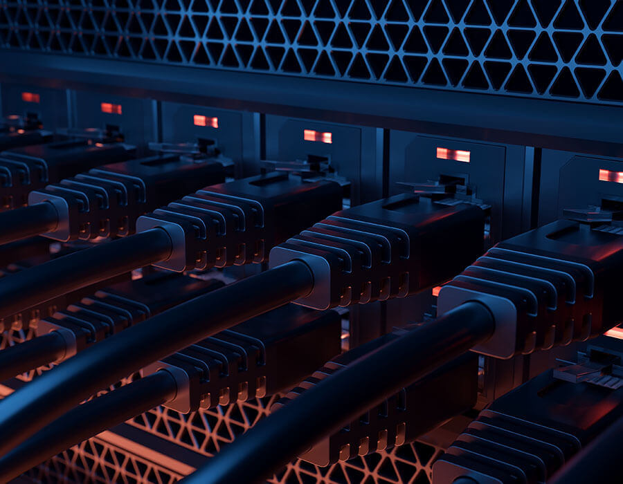 Close up of a telecommunication server with cables in it.